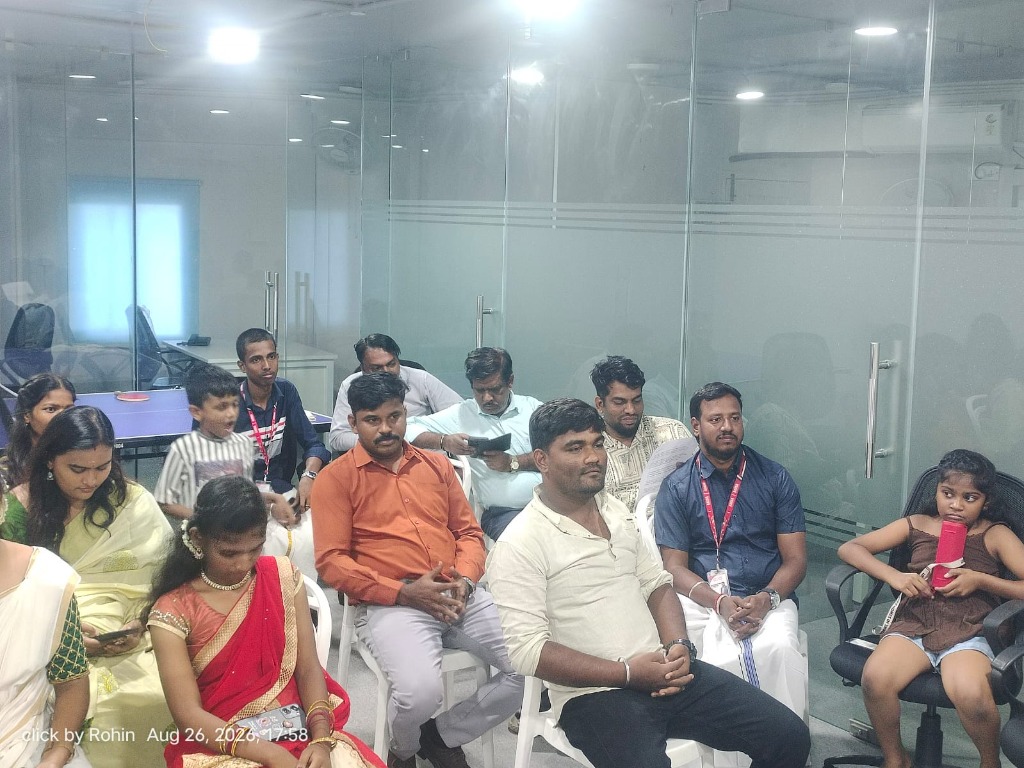 Colleagues celebrating Onam in traditional attire