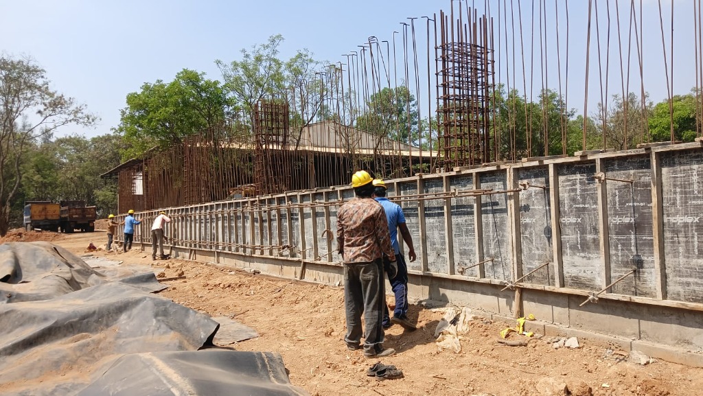 Alignment of 12-inch RC wall shuttering panels and vertical column rebar cages